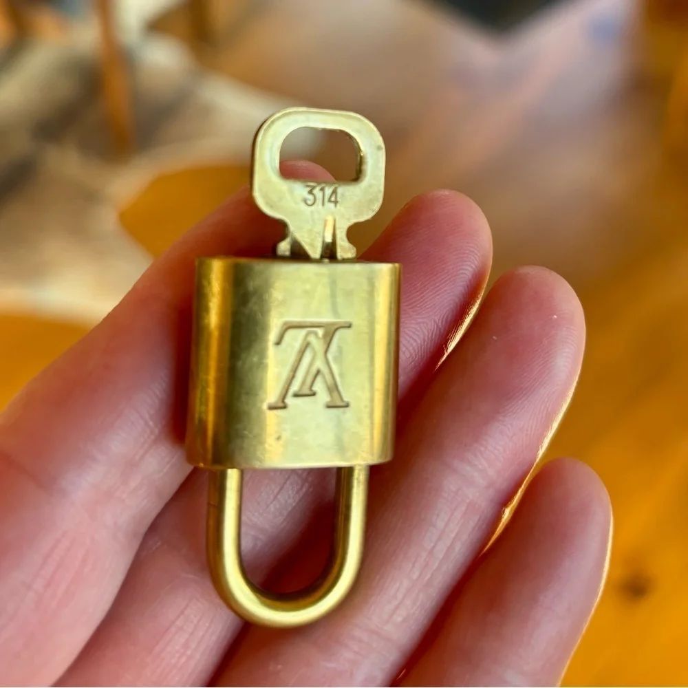 LOUIS VUITTON Authentic Gold Padlock with Key